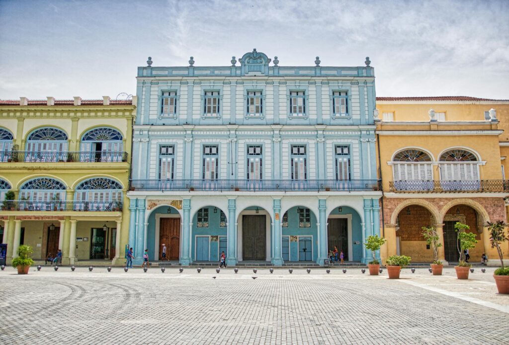 Historic colonial buildings in vibrant Havana, showcasing colorful facades.